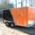 7X12 ENCLOSED CARGO TRAILER WITH MOTORCYCLE PACKAGE BLACK and ORANGE - $3900 (Baton rouge) - Image 2