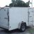 NEW 5 ft. x10 White Exterior Enclosed Trailer w/2' Side Door & Vfront! - Image 1