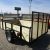 American Manufacturing 6x10 Utility Trailer w/ wood sides gate - $1699 - Image 1